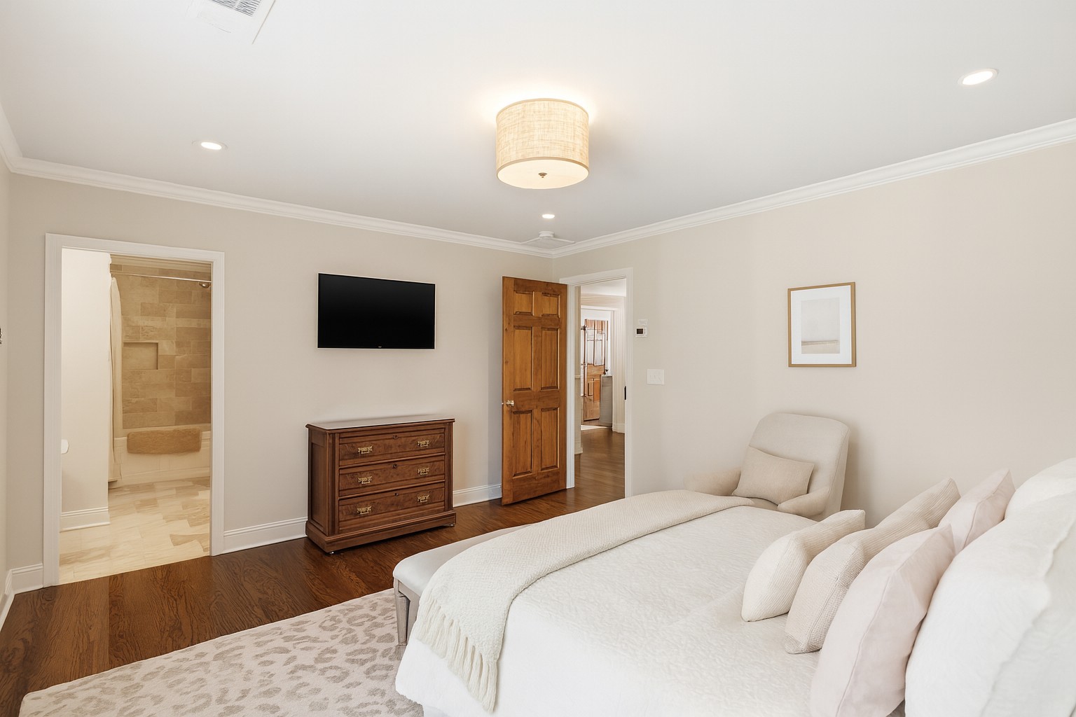 714 Farrell Road Nashville, TN 37220 - Photo 37 of 66 a bedroom with a bed and a flat screen tv