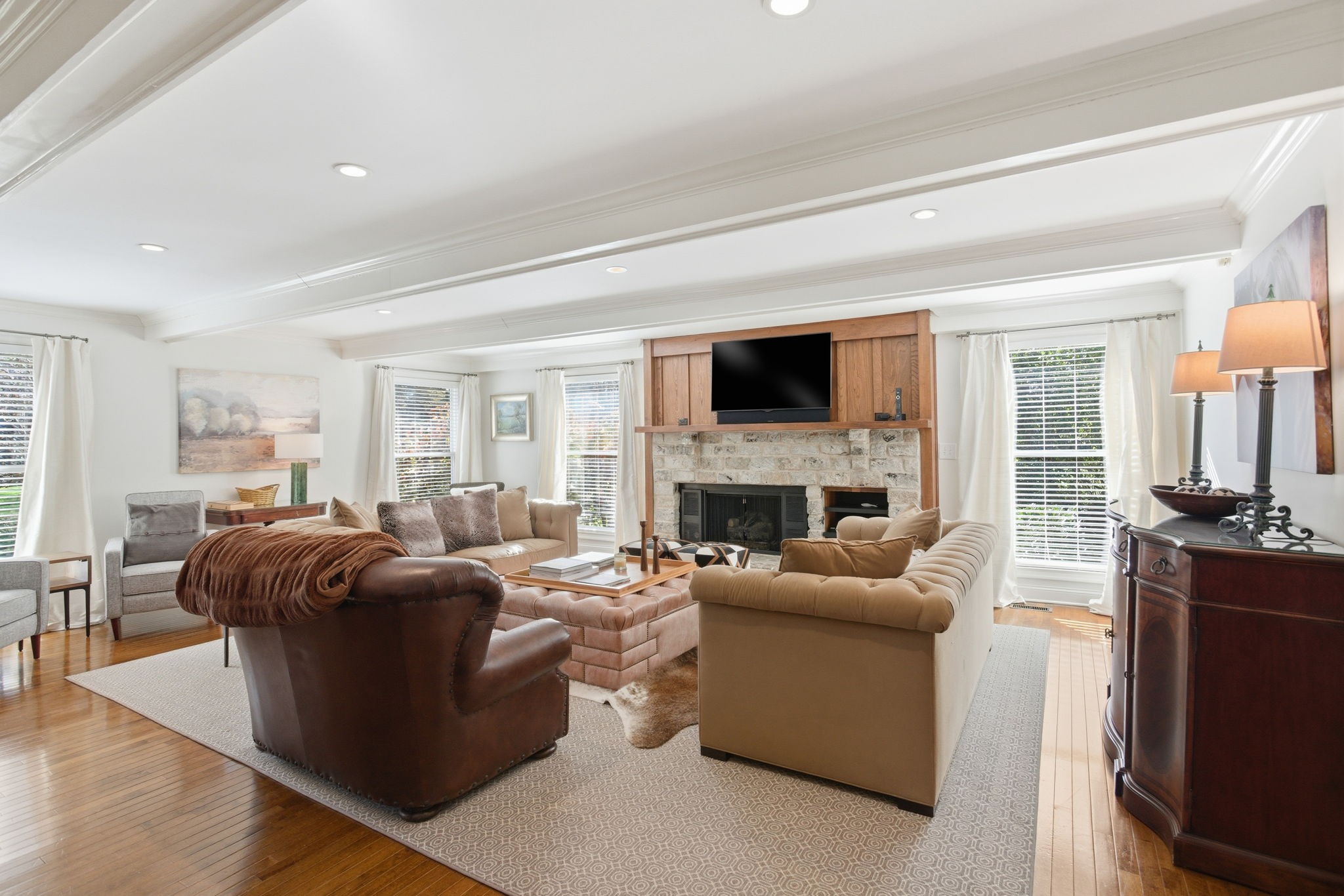 714 Farrell Road Nashville, TN 37220 - Photo 4 of 66 a living room with furniture fireplace and a flat screen tv