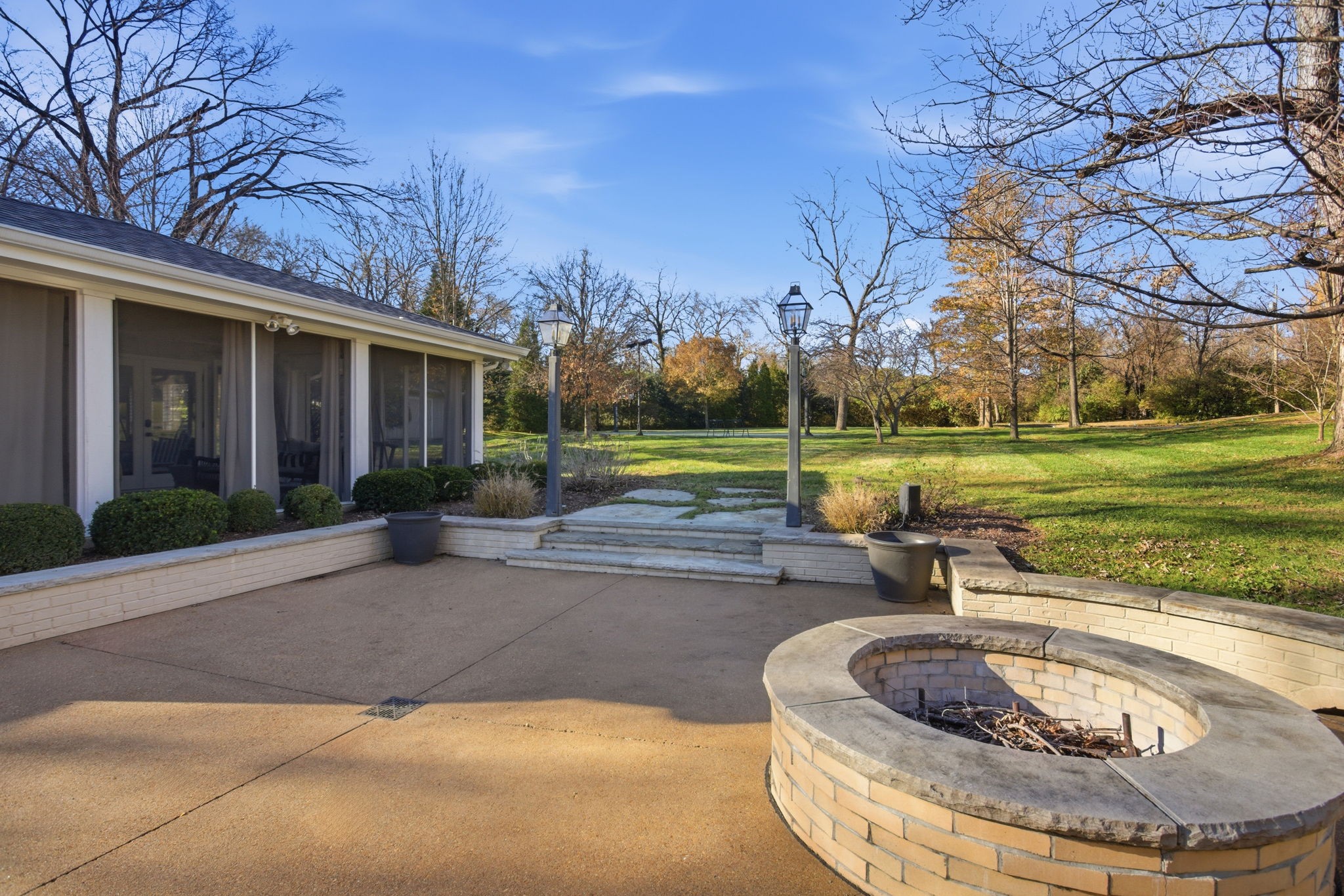714 Farrell Road Nashville, TN 37220 - Photo 51 of 66 a view of a house with a yard and sitting area