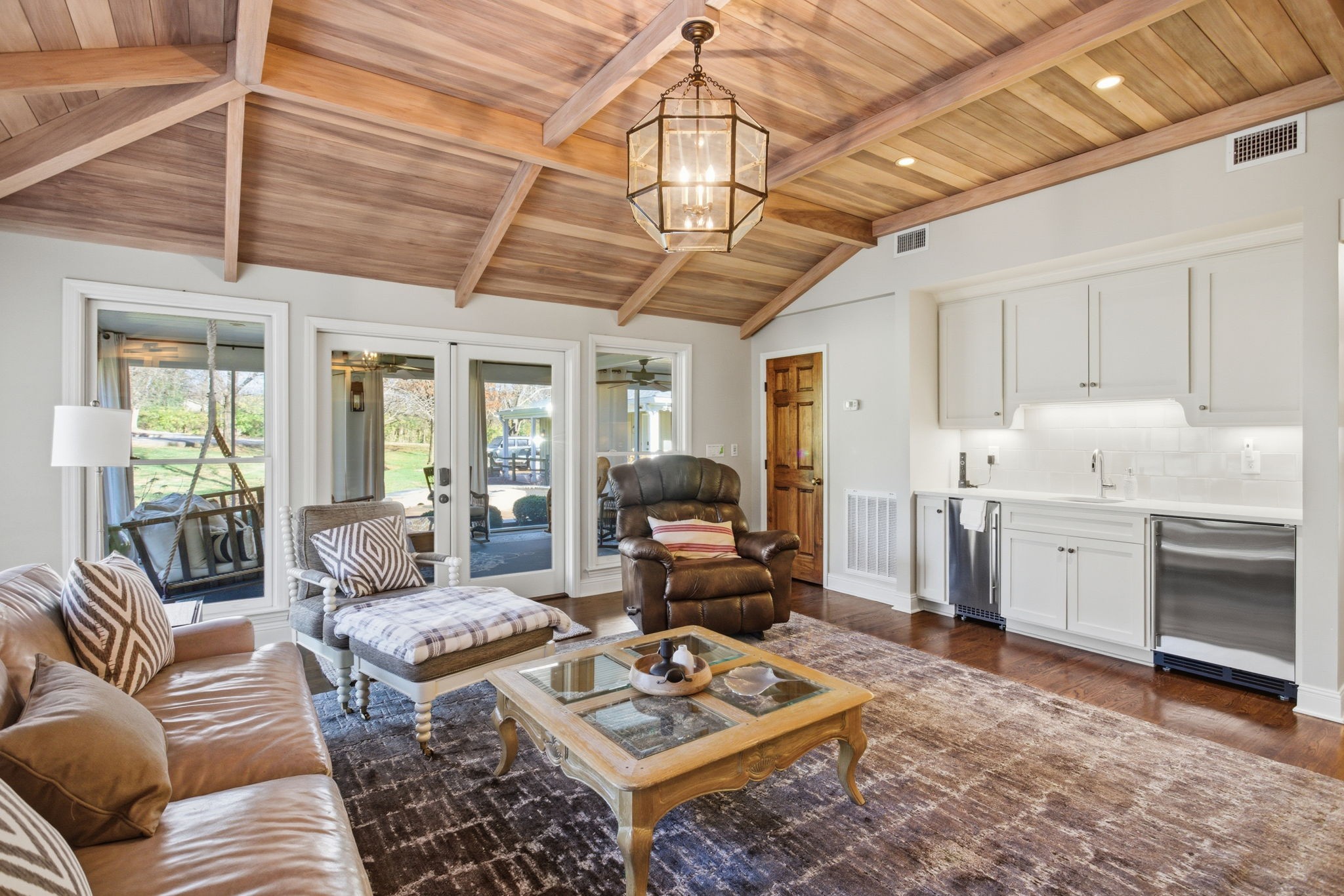 714 Farrell Road Nashville, TN 37220 - Photo 8 of 66 a living room with furniture a chandelier and a dining table