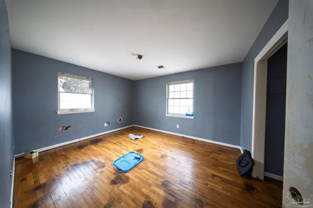 a view of an empty room and window