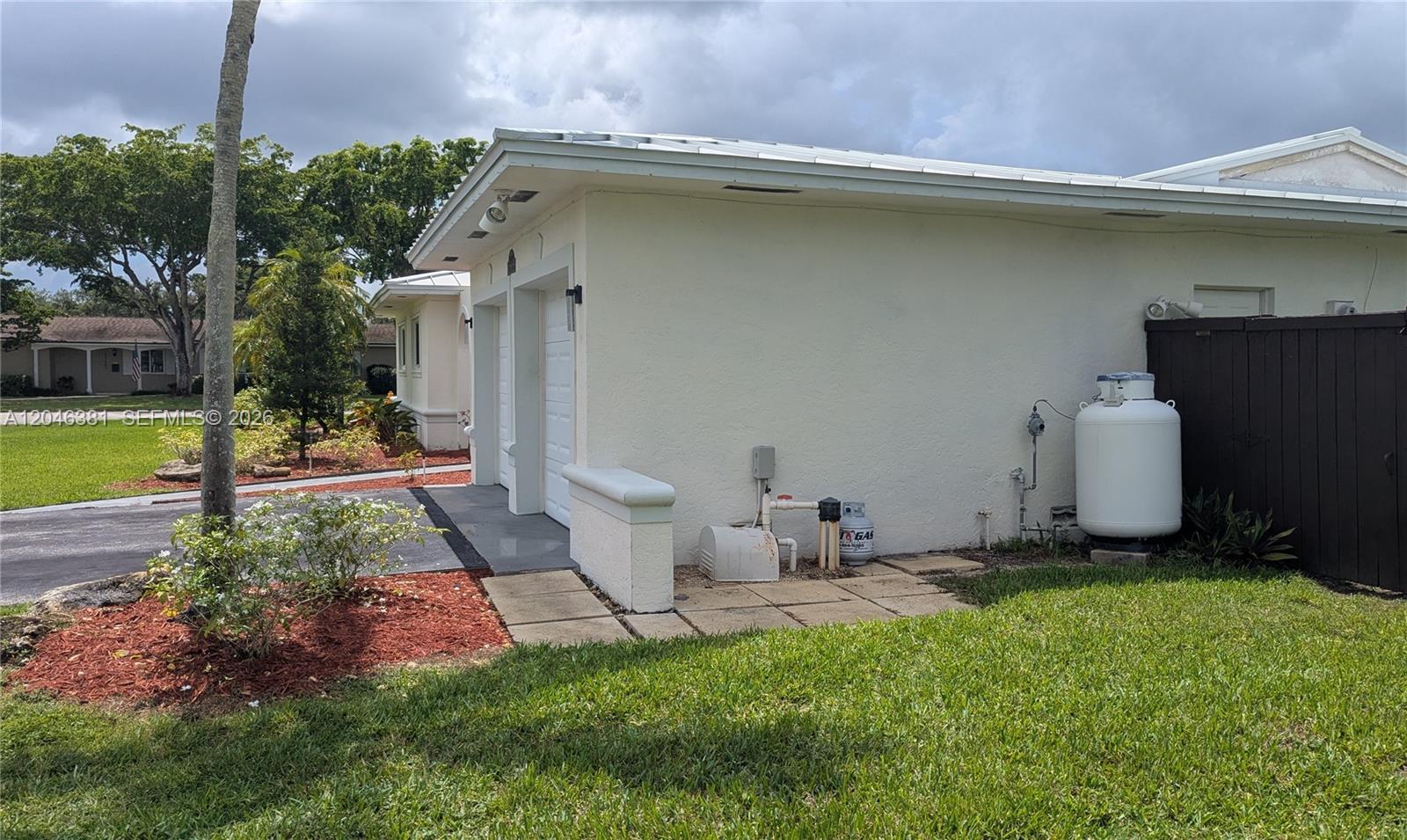 10442 Southwest 114th Street Miami, FL 33176 - Photo 16 of 48 Propane tank; Irrigation pump