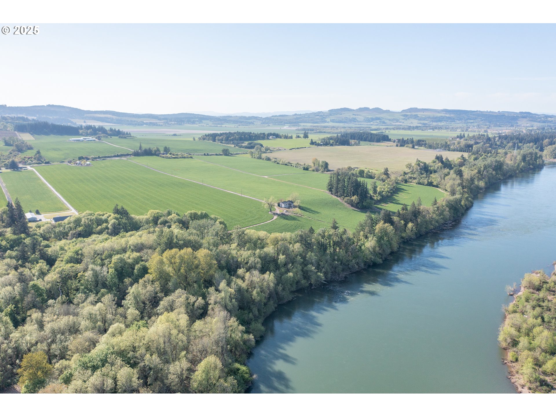 3372 Riverbend Road Salem, OR 97304 - Photo 2 of 40 a view of a lake with a mountain