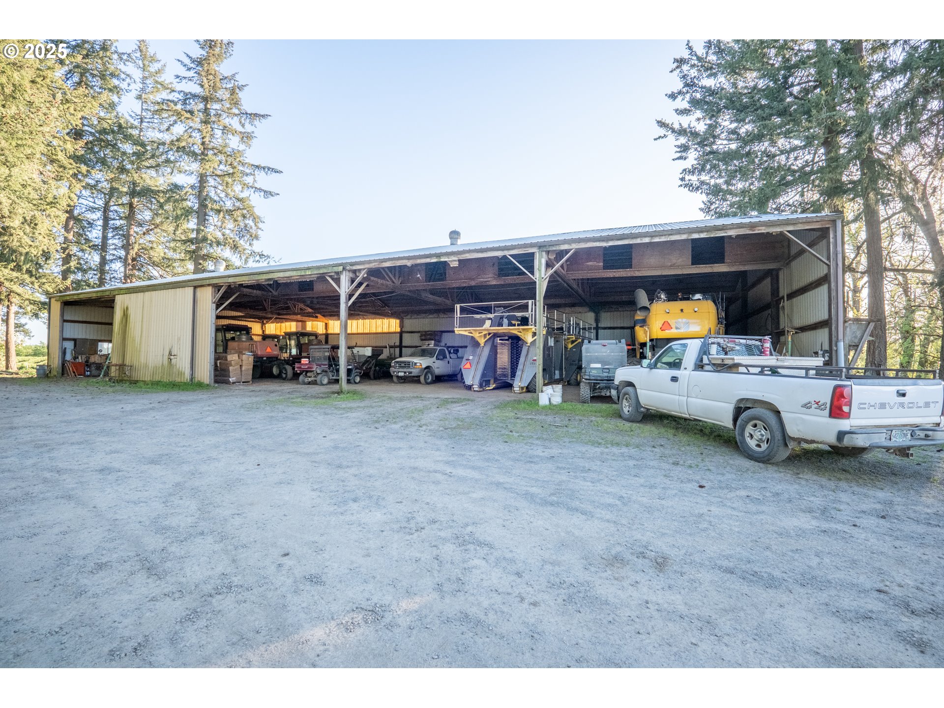 3372 Riverbend Road Salem, OR 97304 - Photo 21 of 40 a view of a big house with cars parked in front of it