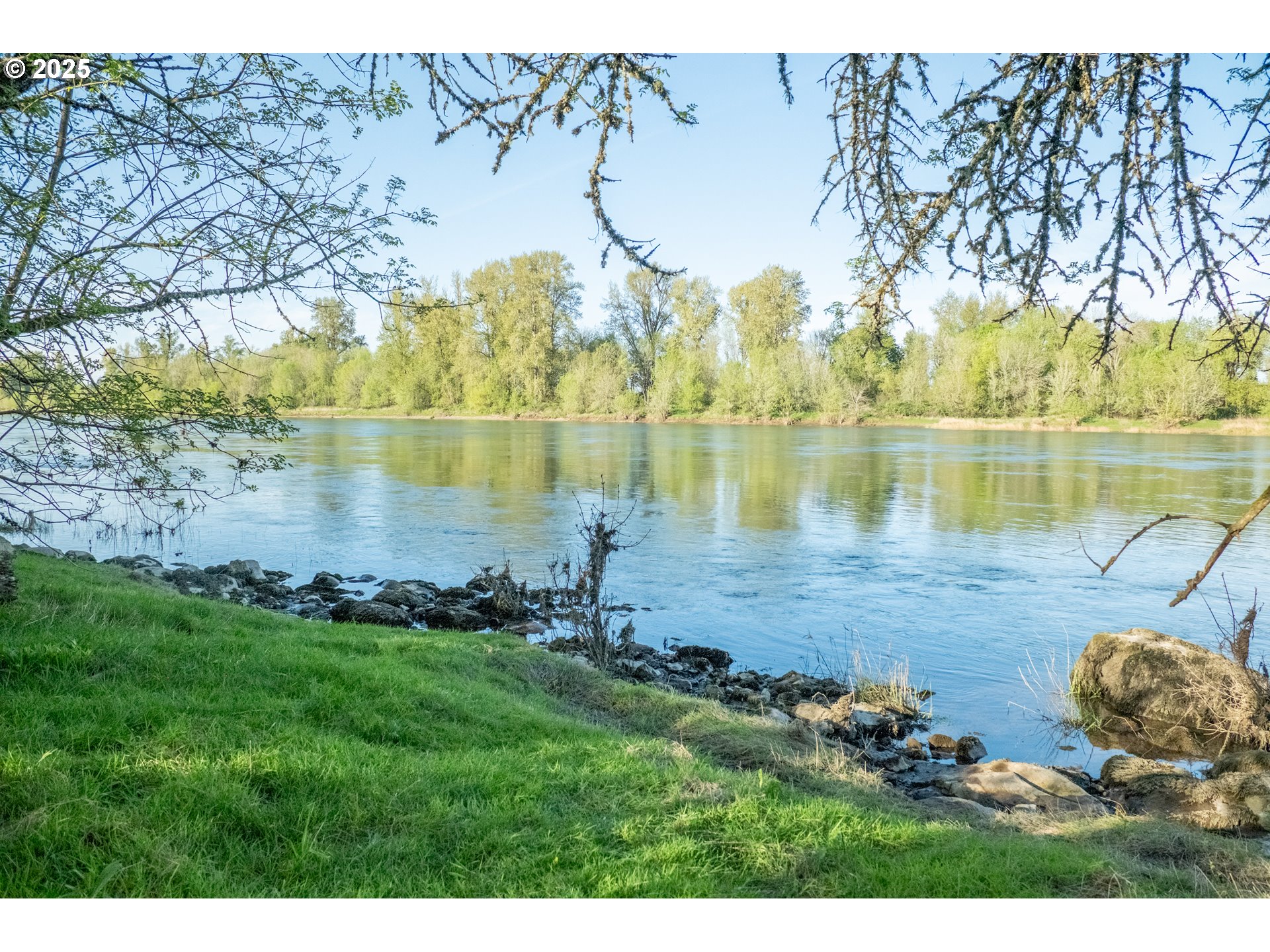 3372 Riverbend Road Salem, OR 97304 - Photo 37 of 40 a view of a lake with a big yard