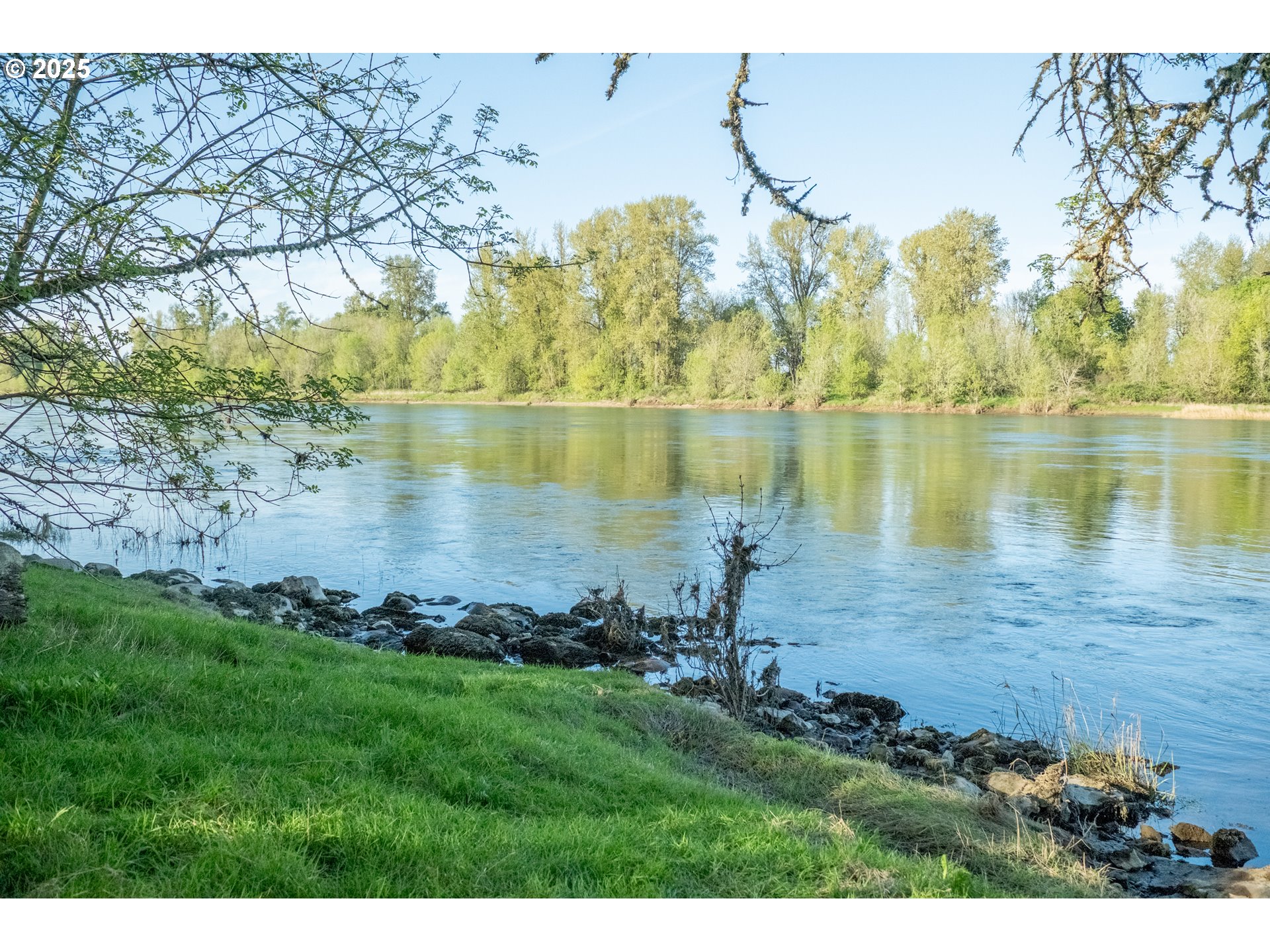 3372 Riverbend Road Salem, OR 97304 - Photo 38 of 40 a view of a lake with a yard