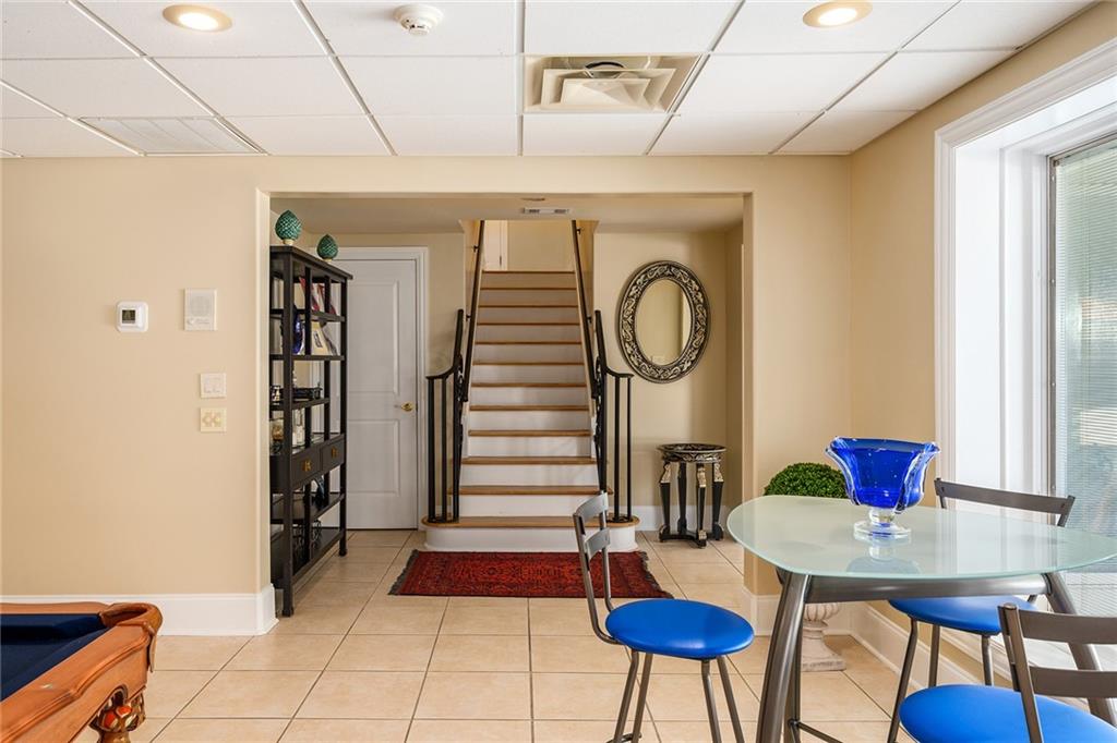 171 McClain Circle Macon, GA 31216 - Photo 42 of 56 a view of a dining room with furniture and a rug