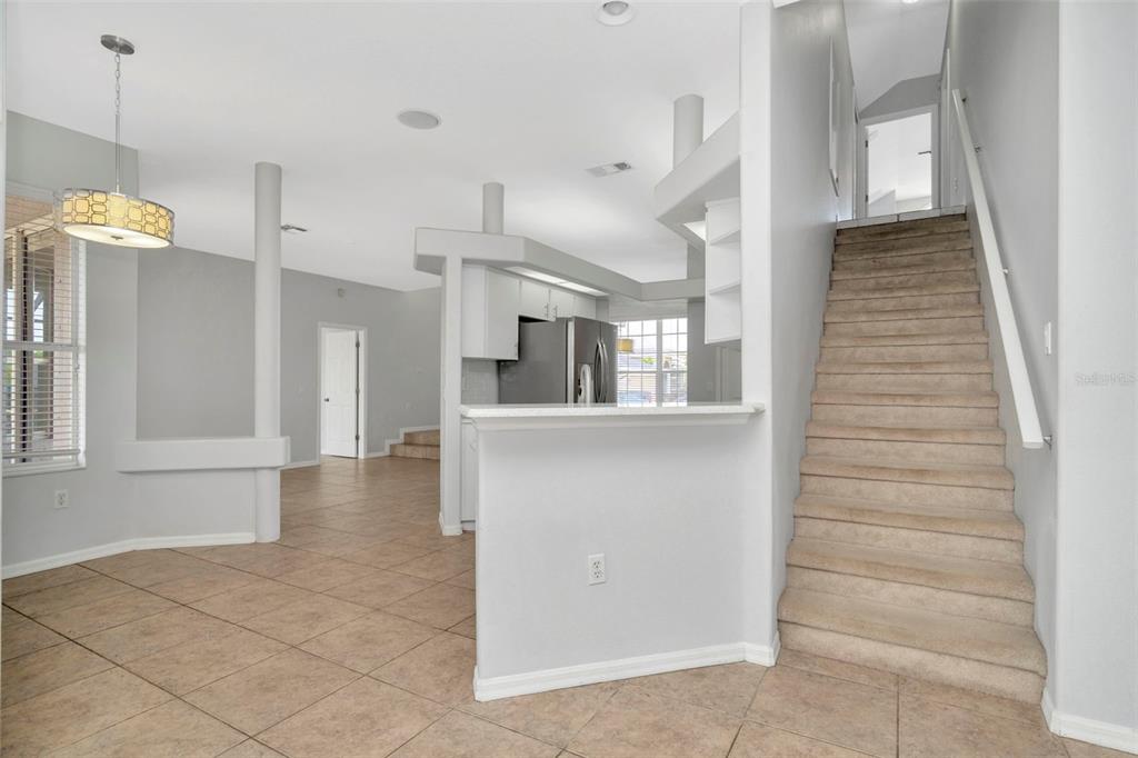 8918 Linebrook Drive Trinity, FL 34655 - Photo 11 of 50 a view of entryway and hall with wooden floor