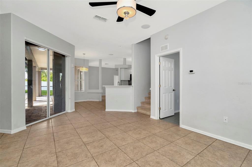 8918 Linebrook Drive Trinity, FL 34655 - Photo 12 of 50 a view of a kitchen with a refrigerator and a window