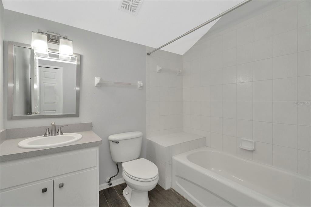 8918 Linebrook Drive Trinity, FL 34655 - Photo 31 of 50 a bathroom with a sink toilet and shower