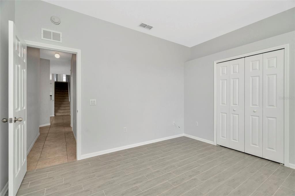 8918 Linebrook Drive Trinity, FL 34655 - Photo 36 of 50 a view of a hallway with wooden floor