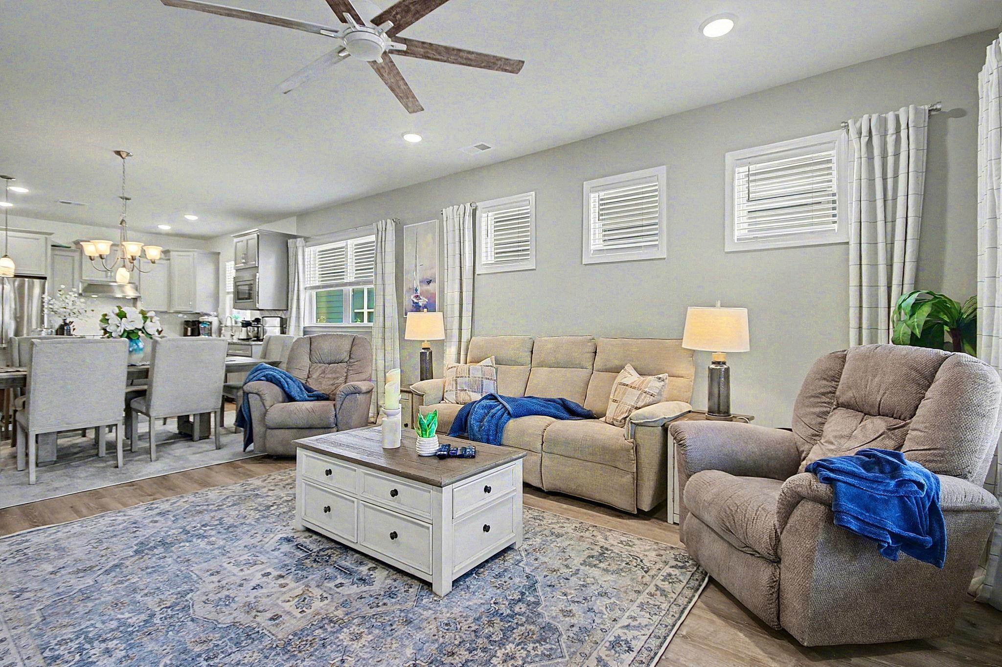 5830 Cremona Drive Myrtle Beach, SC 29577 - Photo 17 of 39 Living area featuring recessed lighting, wood finished floors, a chandelier, and a ceiling fan