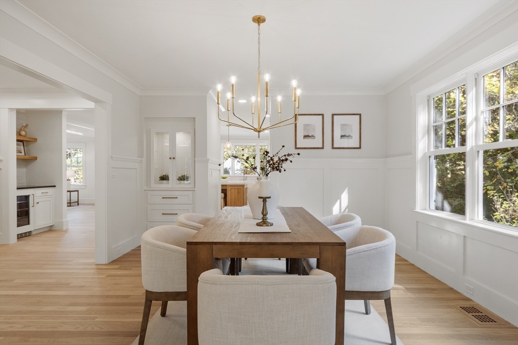 140 Revolutionary Road Concord, MA 01742 - Photo 10 of 41 a view of a dining room with furniture window and wooden floor