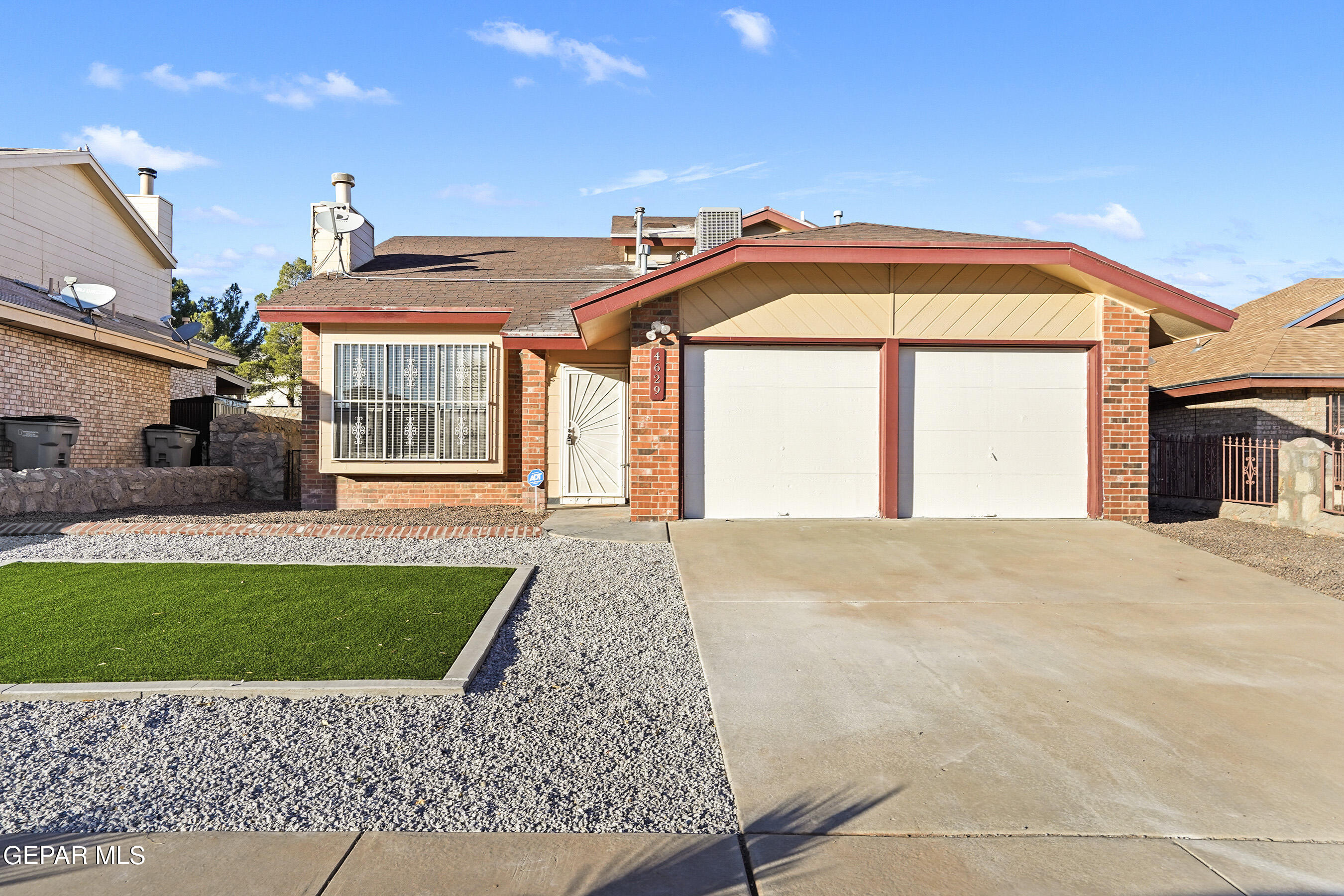 4629 Loma Escondida Drive El Paso, TX 79934 - Photo 1 of 1 a front view of a house with garden