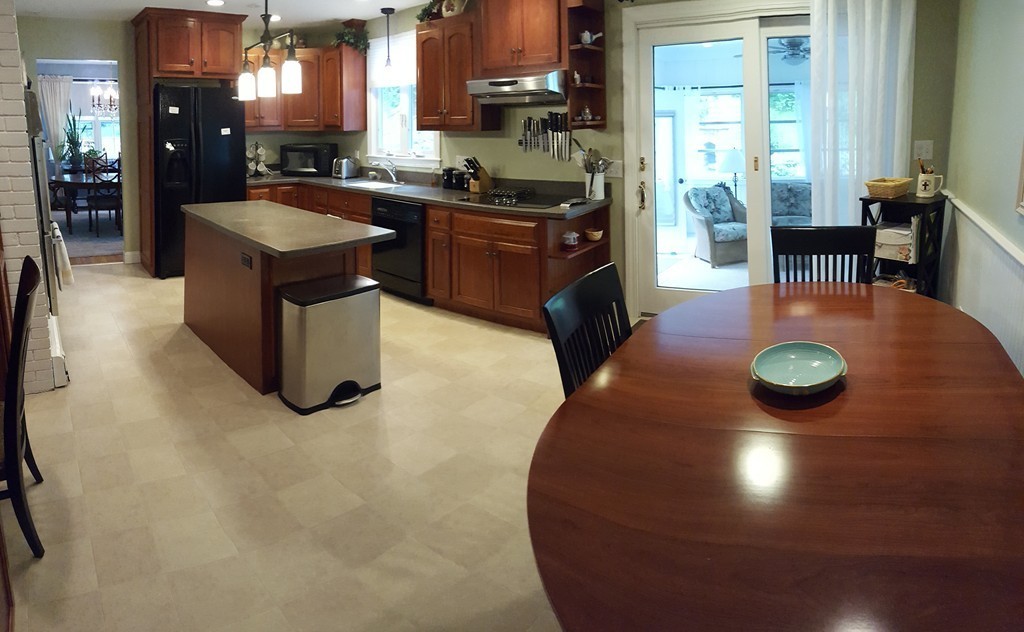 7 Mohawk Road Canton, MA 02021 - Photo 3 of 19 a kitchen with stainless steel appliances granite countertop a stove a sink and a refrigerator
