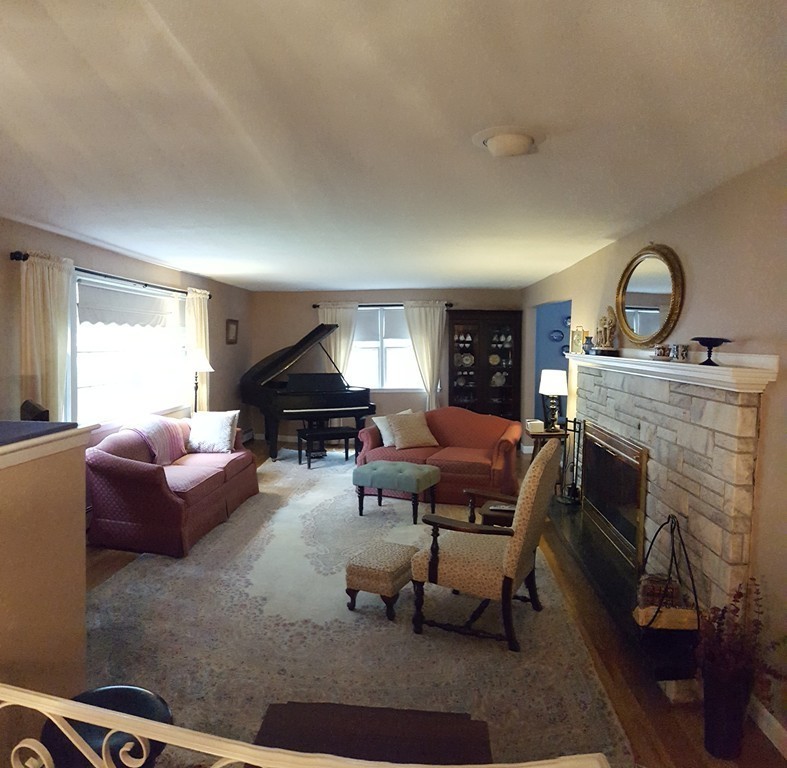 7 Mohawk Road Canton, MA 02021 - Photo 6 of 19 a living room with furniture and a fireplace