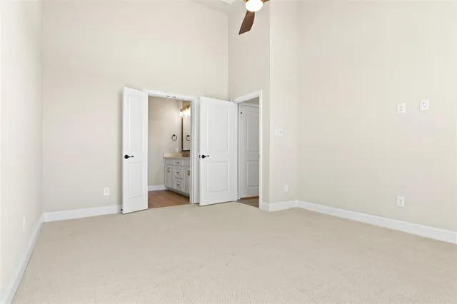 an empty room with a bathroom