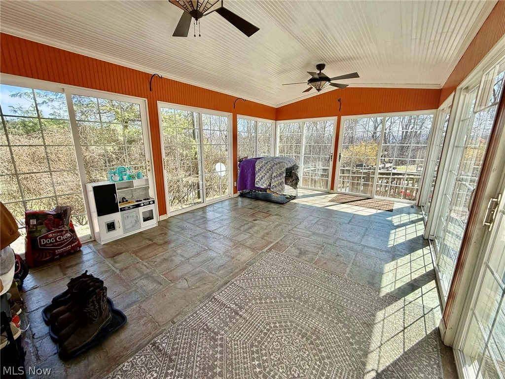7170 Old Town Road Mount Perry, OH 43760 - Photo 26 of 41 Sunroom with a ceiling fan and lofted ceiling