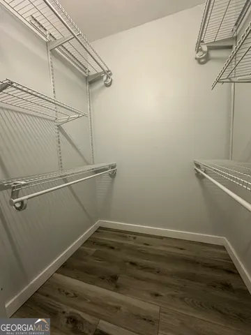 a view of a room with racks on the wall