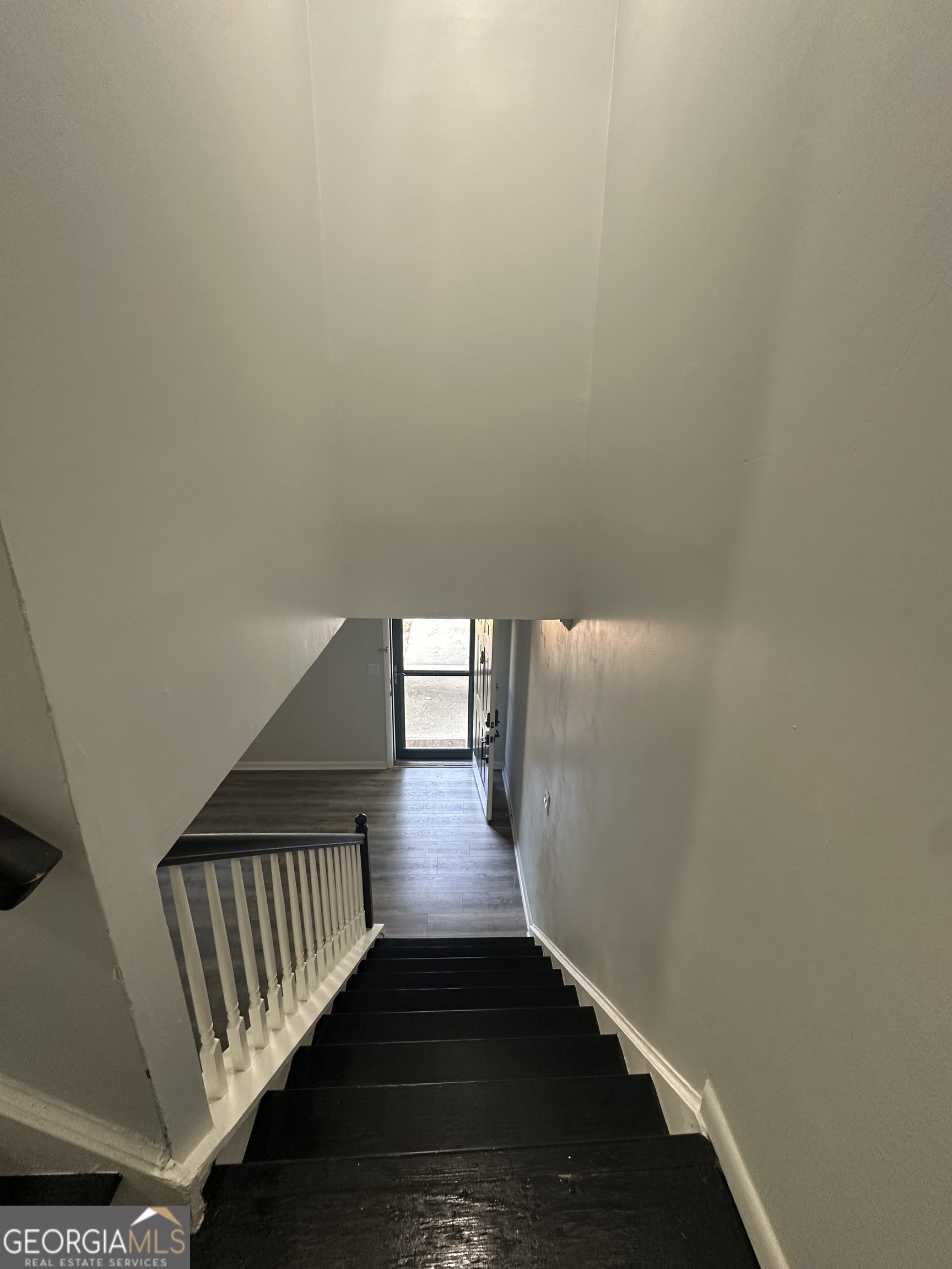 6900 Roswell Road, Unit K8 Sandy Springs, GA 30328 - Photo 4 of 30 a view of entryway with wooden floor