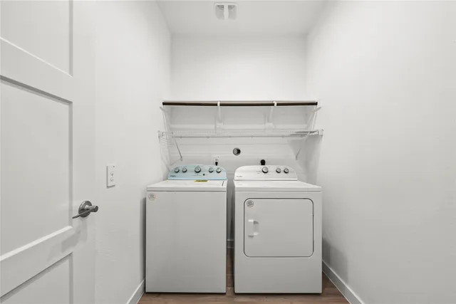 a utility room with dryer and washer