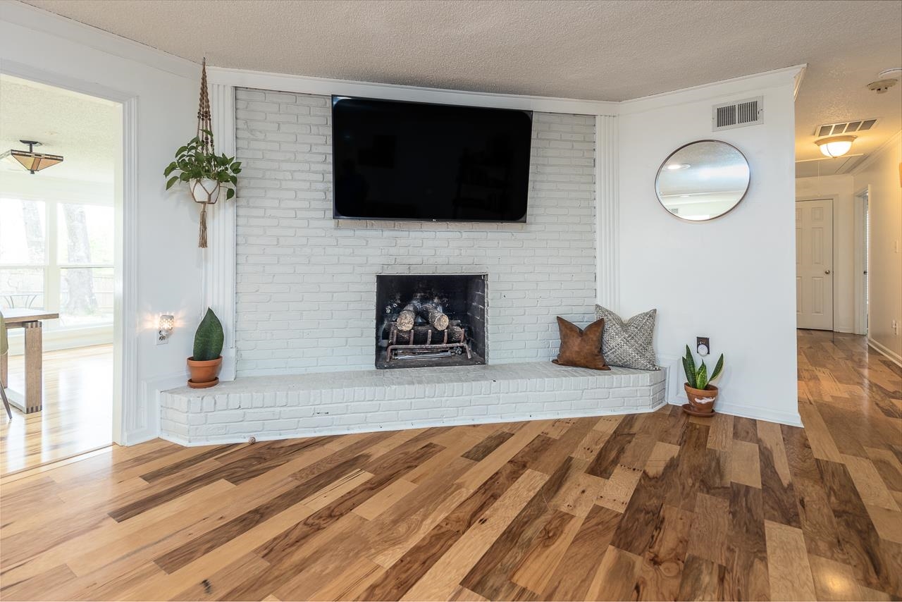 2225 Webbing Drive Memphis, TN 38016 - Photo 3 of 25 a living room with furniture and a fireplace