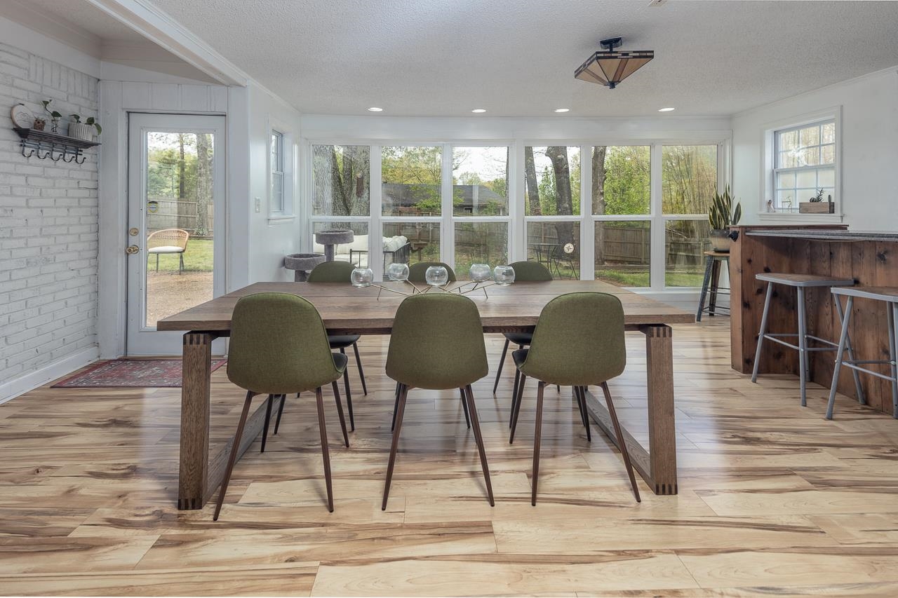 2225 Webbing Drive Memphis, TN 38016 - Photo 6 of 25 a view of a dining room with furniture window and wooden floor