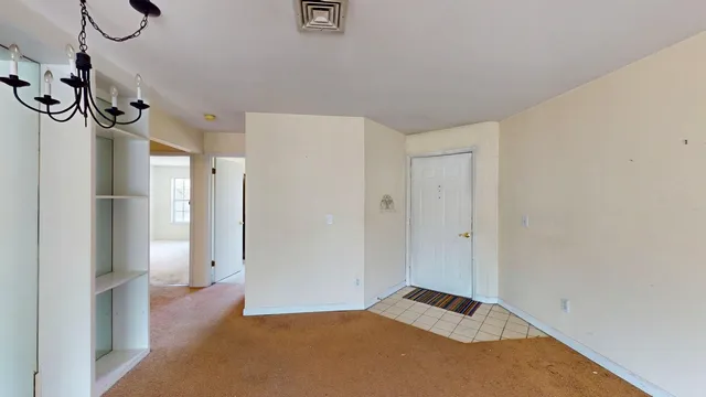 a view of a room with an empty space