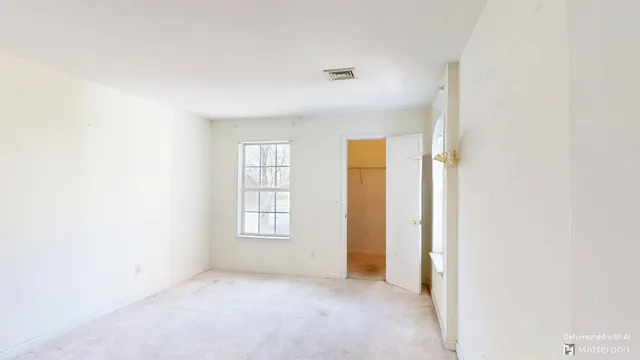 an empty room with windows