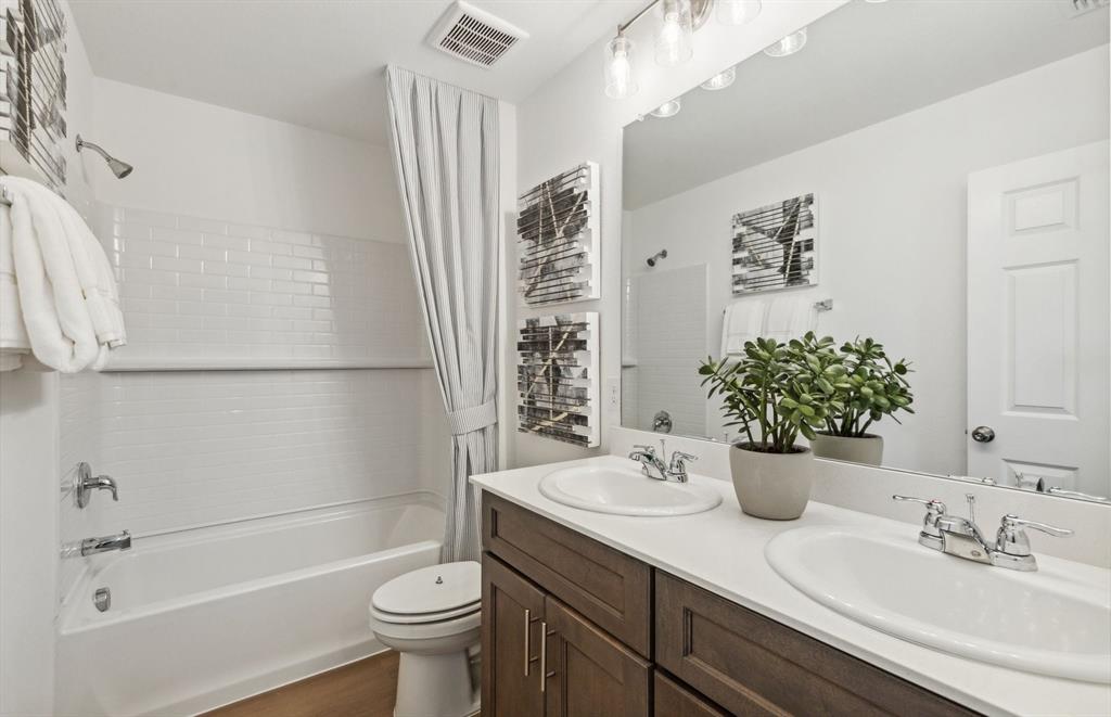 1136 Loch Way Princeton, TX 75407 - Photo 14 of 17 Spacious secondary bathroom *model representation