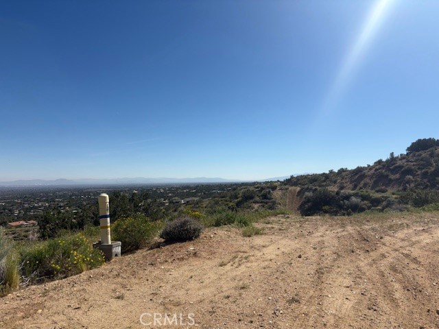0 None Pinon Hills Pinon Hills, CA 92372 - Photo 6 of 11 a view of a dry yard with wooden fence