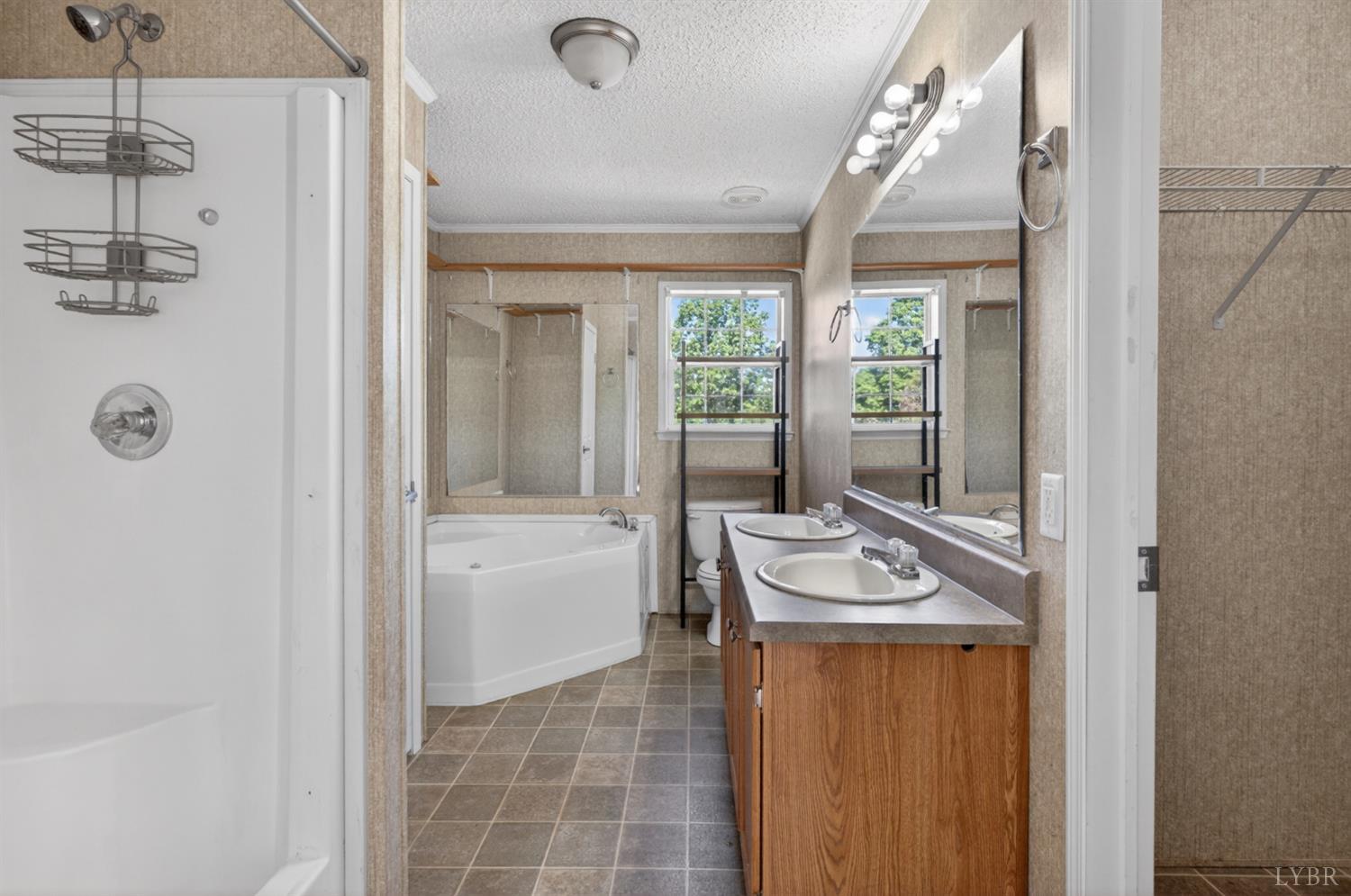 1811 Mohawk Road Gladys, VA 24554 - Photo 9 of 51 a bathroom with a tub sink and shower