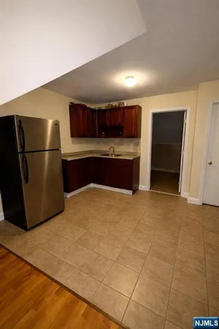 an empty room with a hard wood floor