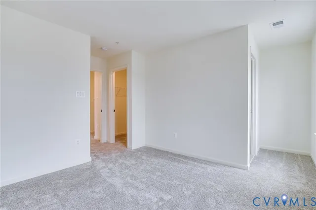 a sign that is sitting on a brick wall