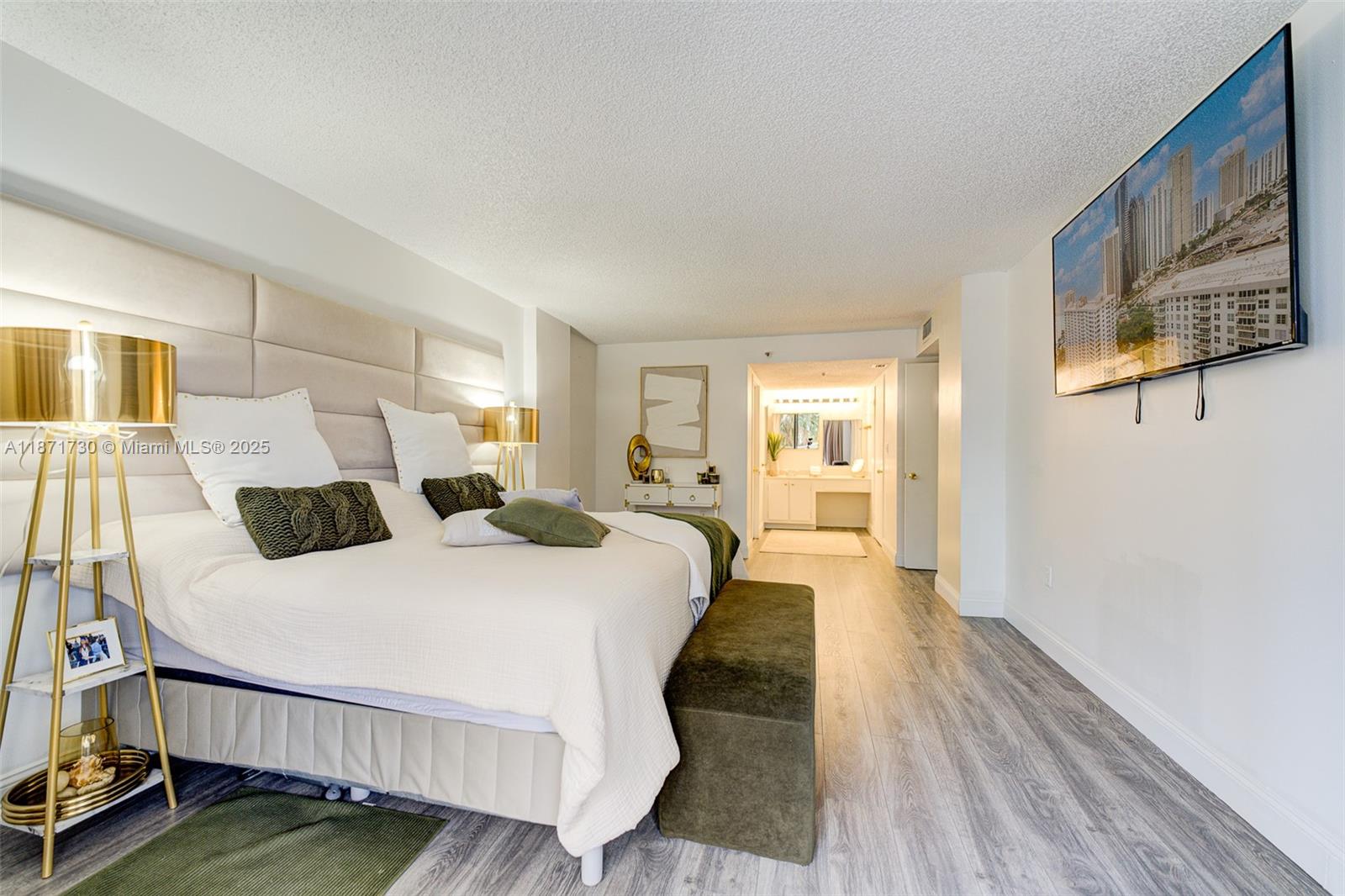 210 174th Street, Unit 312 Sunny Isles Beach, FL 33160 - Photo 15 of 16 a bedroom with double bed and a window