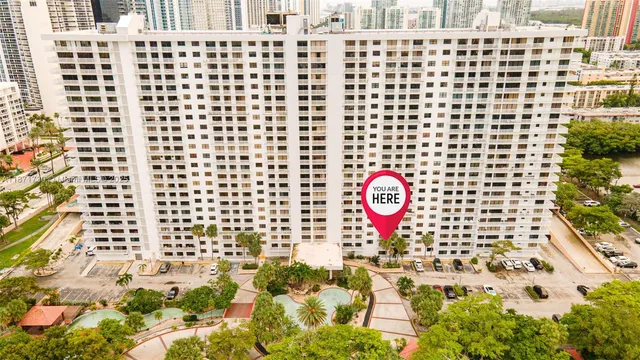 a bathroom with a shower toilet and a shower