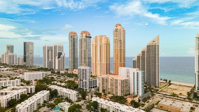 a view of roof with tall buildings