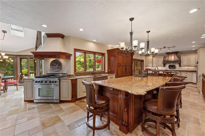 212 Mingo Road Wexford, PA 15090 - Photo 7 of 25 A gourmet kitchen meant for the masses. Dual granites islands with seating, five stoves, two sinks, two dishwashers