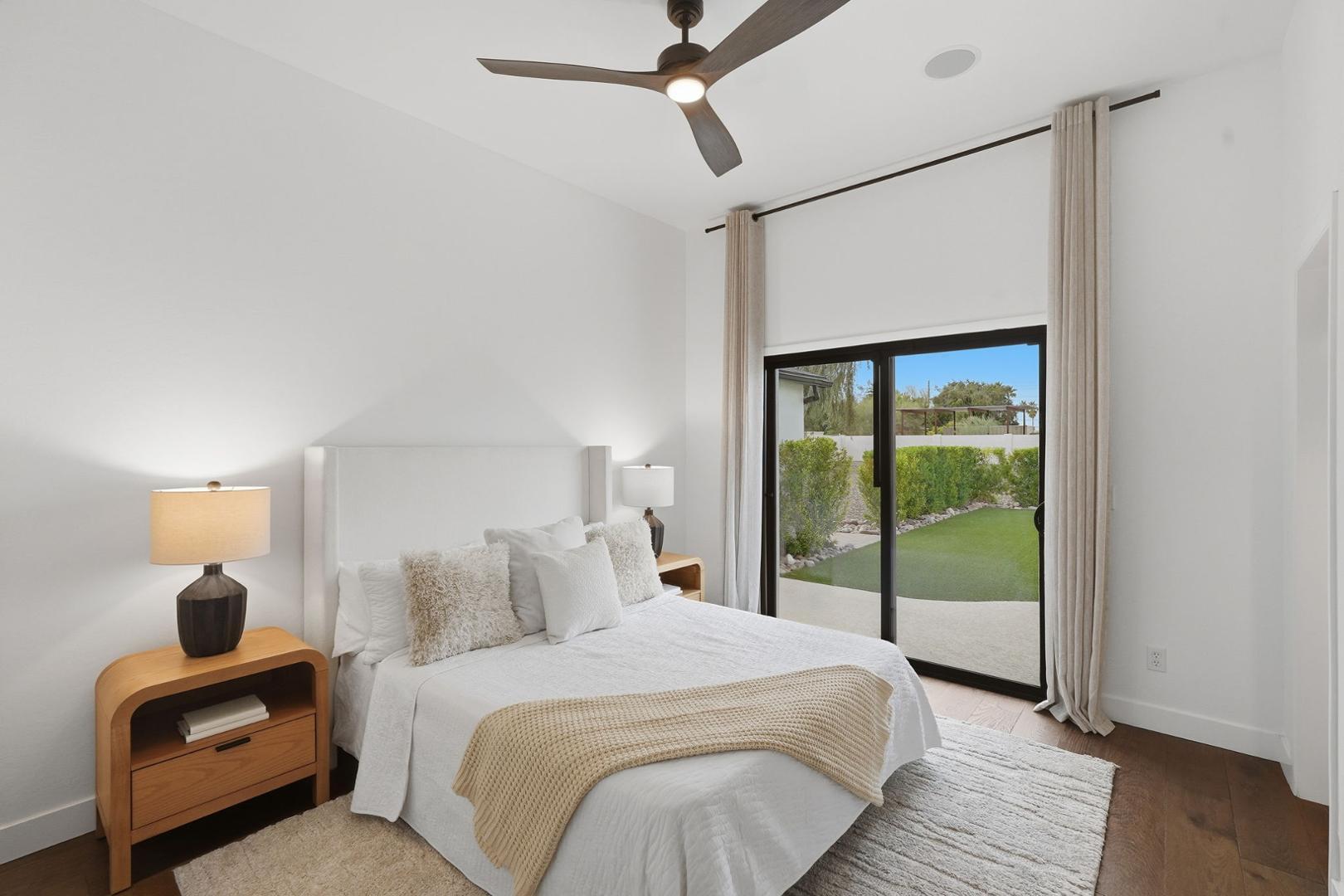 6302 East Cochise Road Paradise Valley, AZ 85253 - Photo 14 of 58 a bedroom with a bed and a window