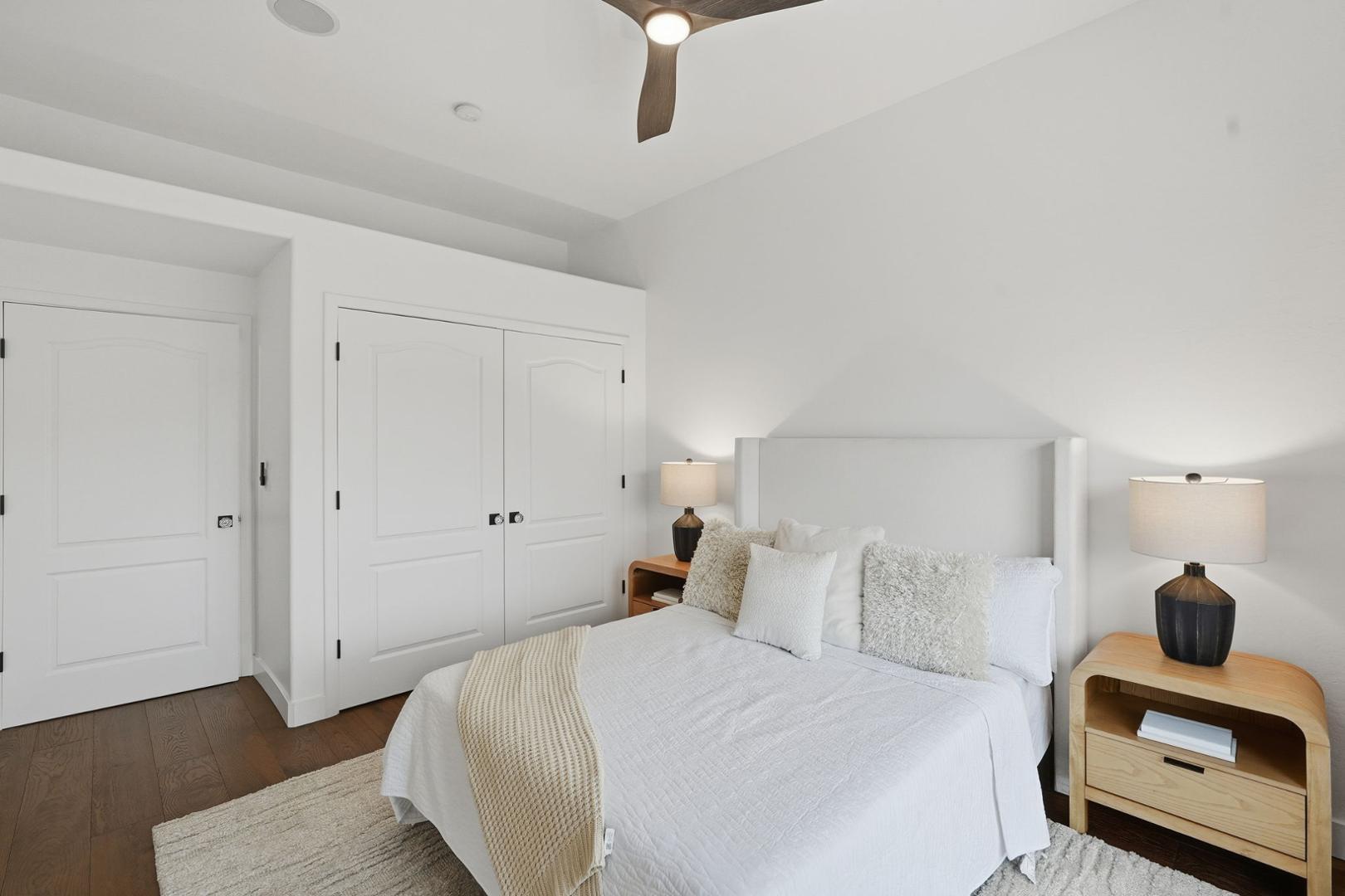 6302 East Cochise Road Paradise Valley, AZ 85253 - Photo 15 of 58 a bedroom with a bed and a view of kitchen