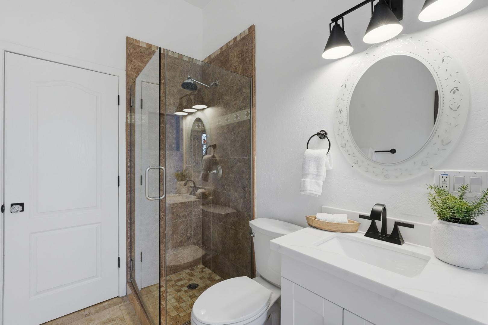 6302 East Cochise Road Paradise Valley, AZ 85253 - Photo 17 of 58 a bathroom with a sink toilet and shower