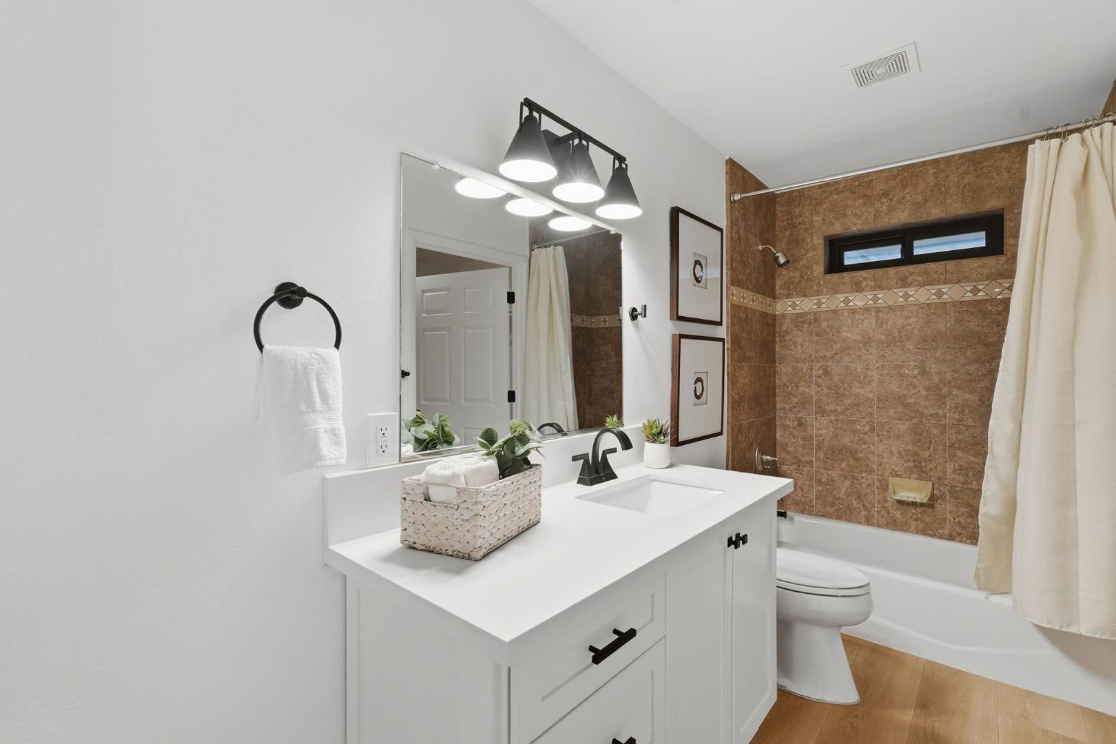 6302 East Cochise Road Paradise Valley, AZ 85253 - Photo 38 of 58 a bathroom with a sink a toilet and shower
