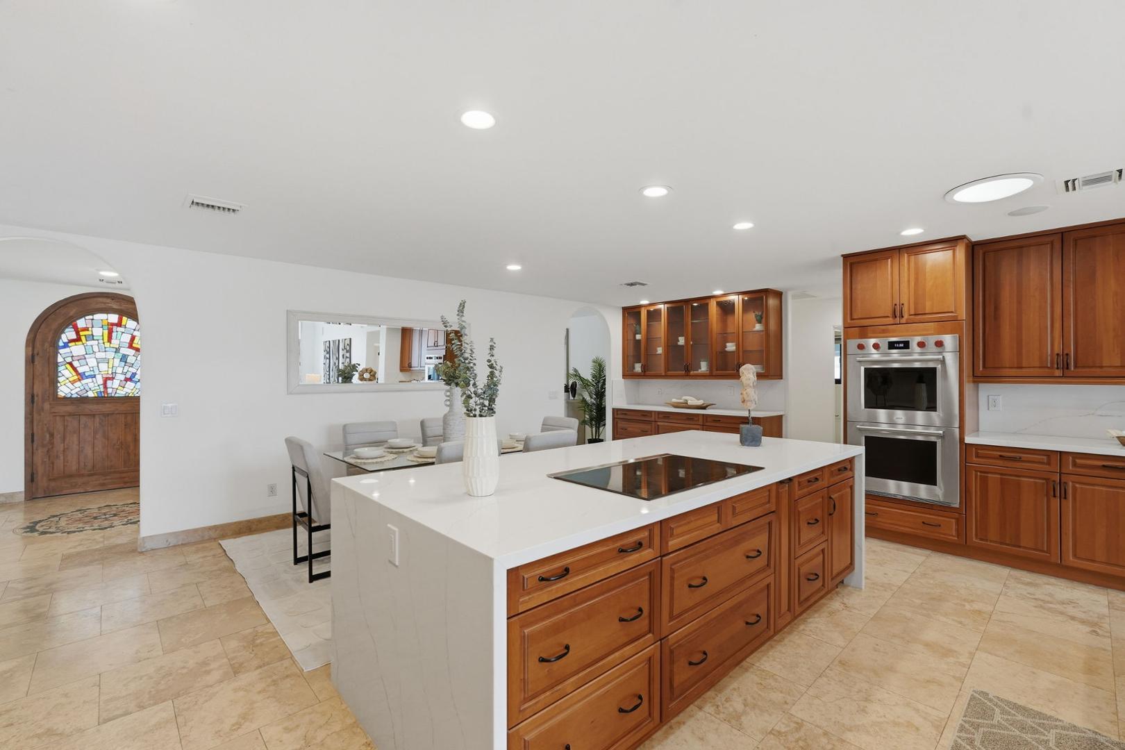 6302 East Cochise Road Paradise Valley, AZ 85253 - Photo 4 of 58 a kitchen with stainless steel appliances granite countertop a sink and cabinets