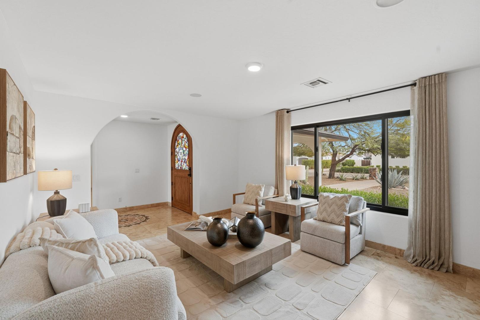 6302 East Cochise Road Paradise Valley, AZ 85253 - Photo 51 of 58 a living room with furniture and a large window