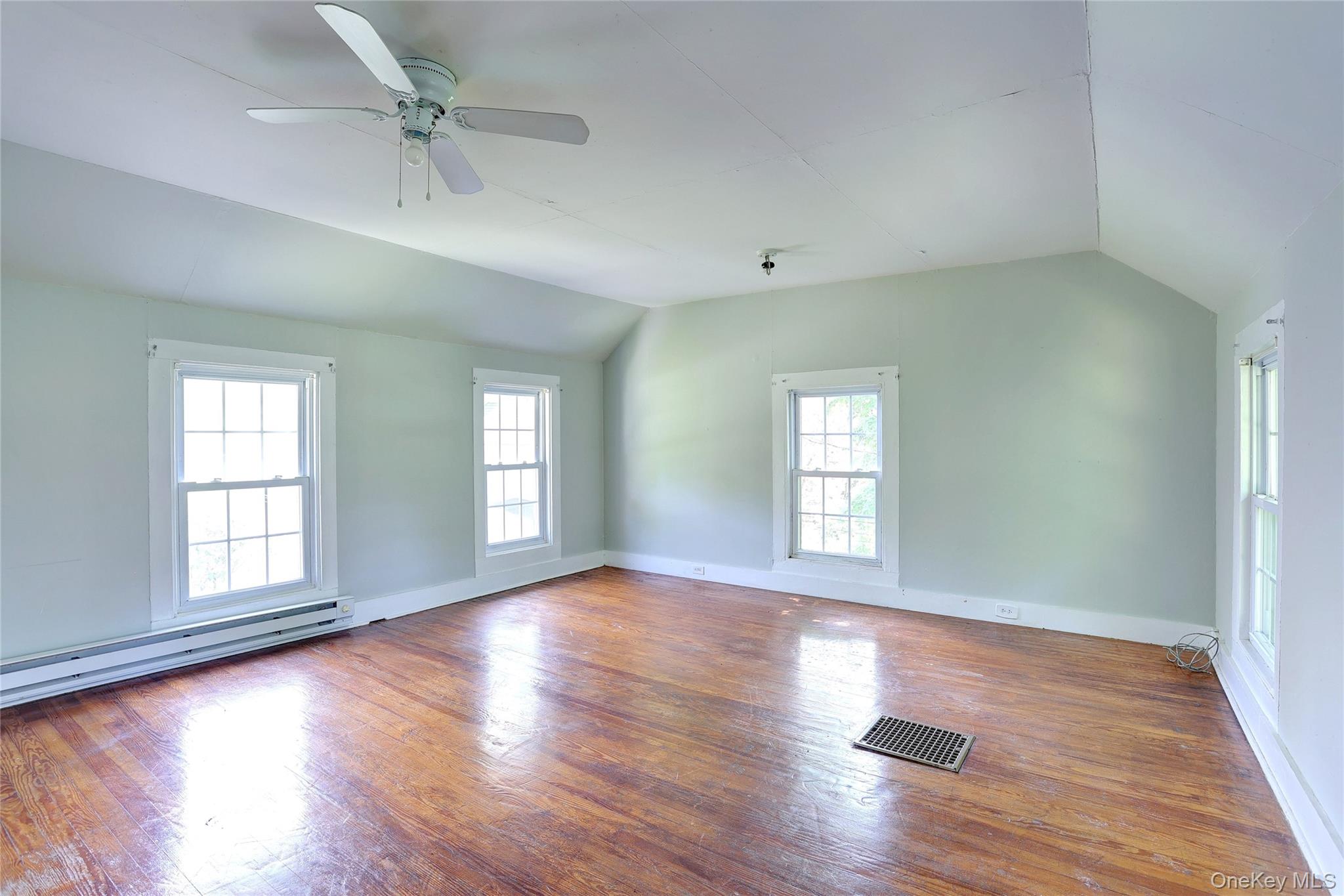 500 Haverstraw Road Suffern, NY 10901 - Photo 20 of 36 a view of empty room with wooden floor and fan