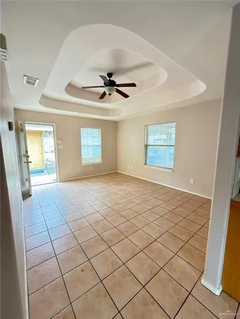 a view of an empty room and window
