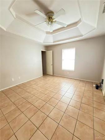 a view of an empty room and window