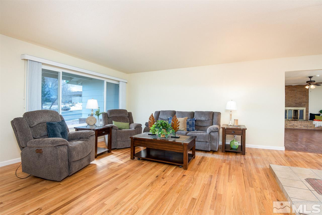 2401 West 7th Street Reno, NV 89503 - Photo 3 of 24 a living room with furniture and a wooden floor