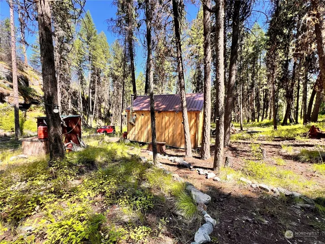 a view of swimming pool with a yard