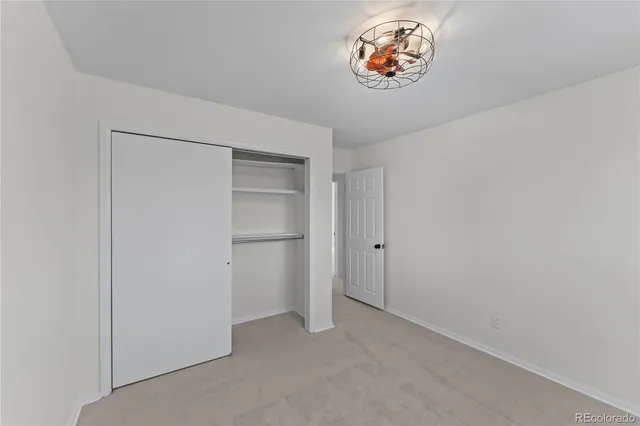 a bathroom with a sink toilet and mirror